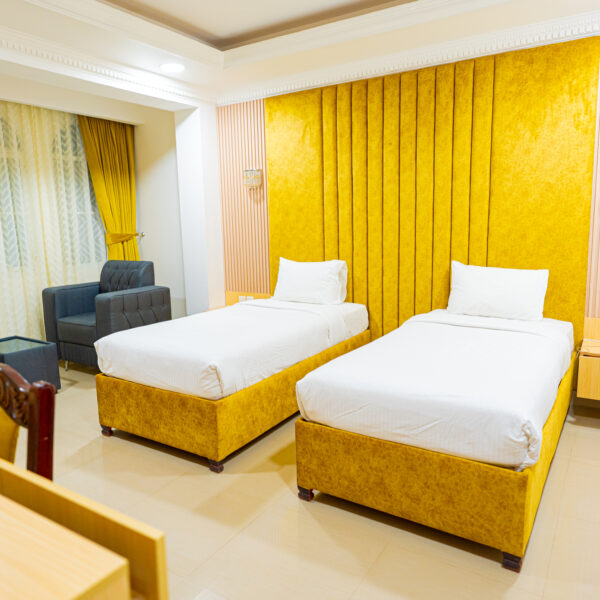 One-bedroom apartment with two single beds